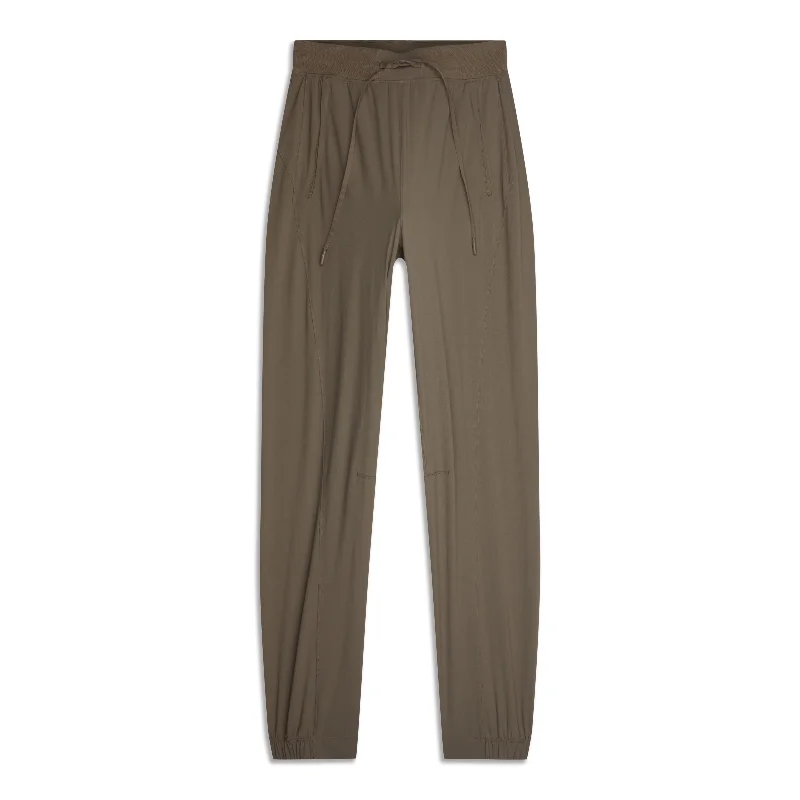 Trendy Tapered Pants for a Chic Look-License To Train High-Rise Pant - Resale